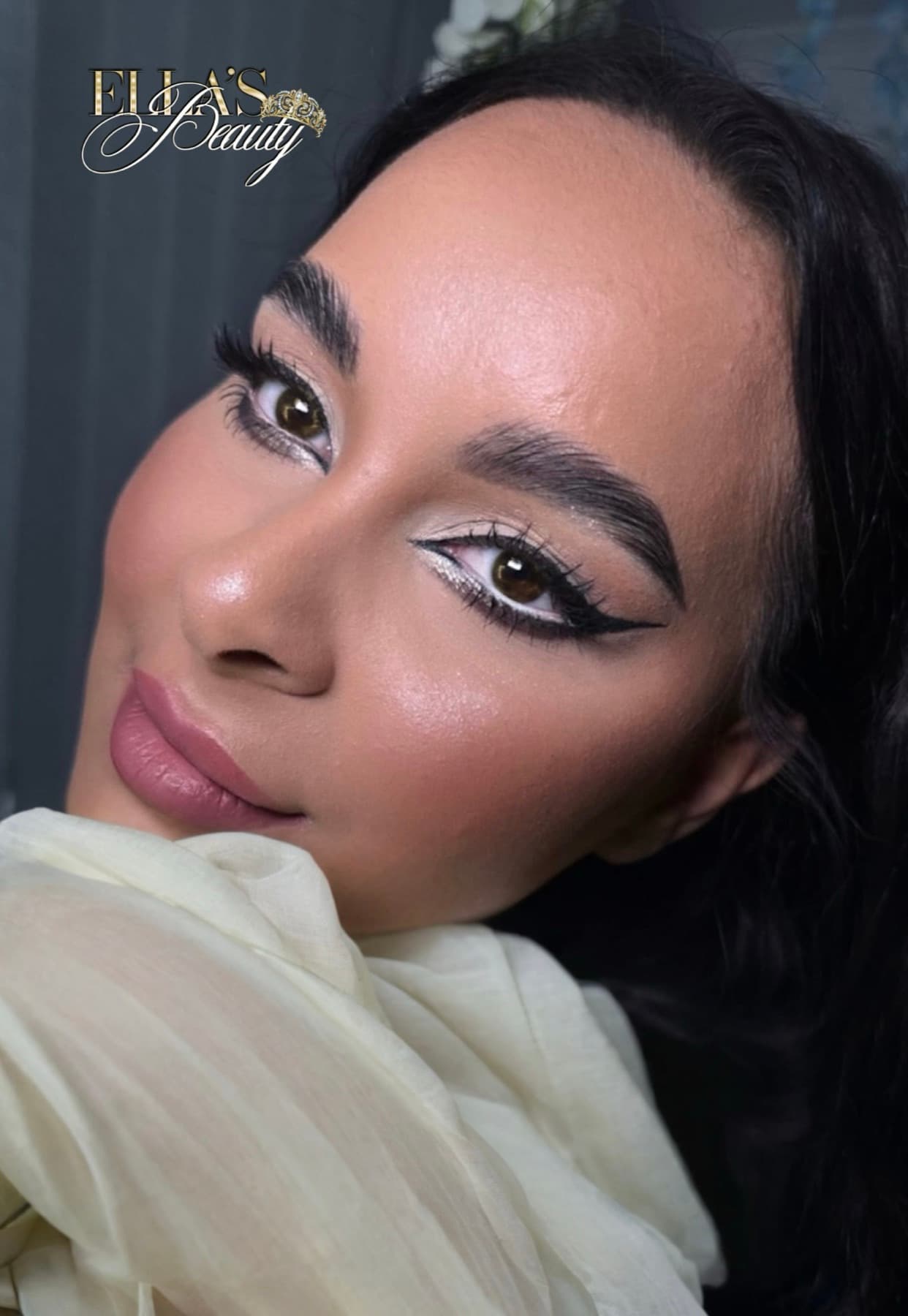 Bridal make-up by Ella’s Beauty — graphic winged liner with luminous skin