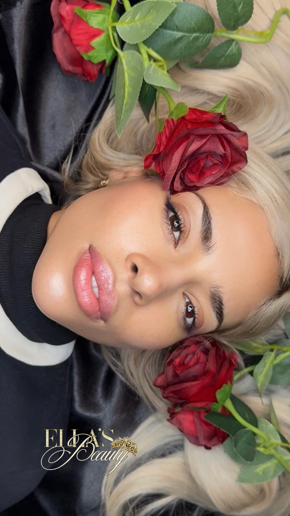 Deep relax face ritual at Ella’s Beauty — client resting with red roses